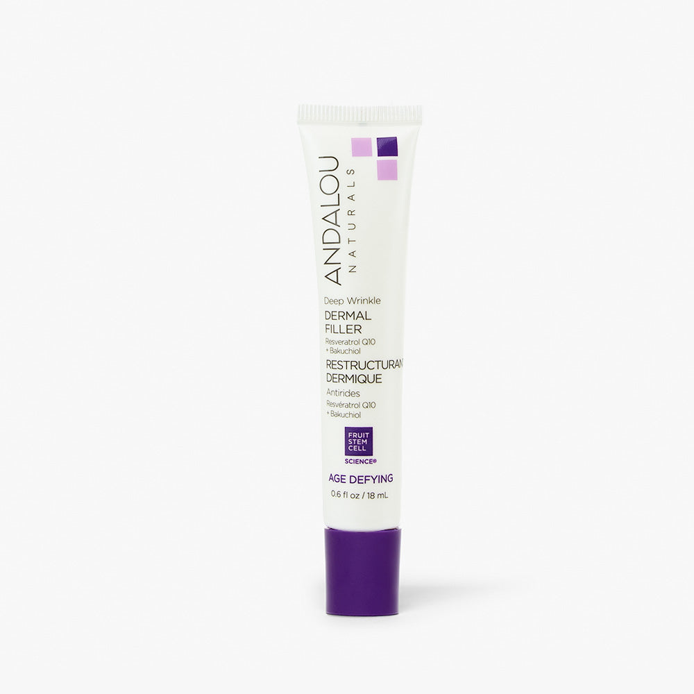 Tube of Andalou Naturals Deep Wrinkle Dermal Filler with Resveratrol Q10 and Bakuchiol, labeled as age-defying, standing upright against a white background.